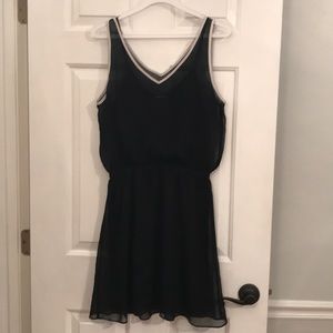 Black sleeveless Express dress.